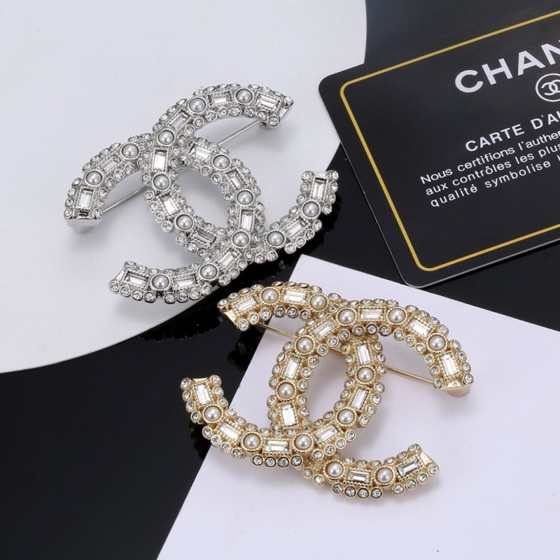 Ch*el brooches